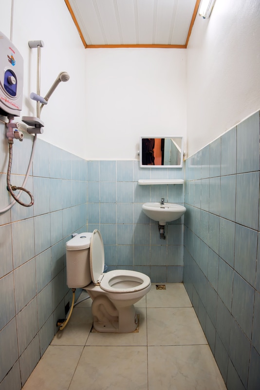 An Asian style wet bathroom in a budget hotel, Veng Vieng, Laos