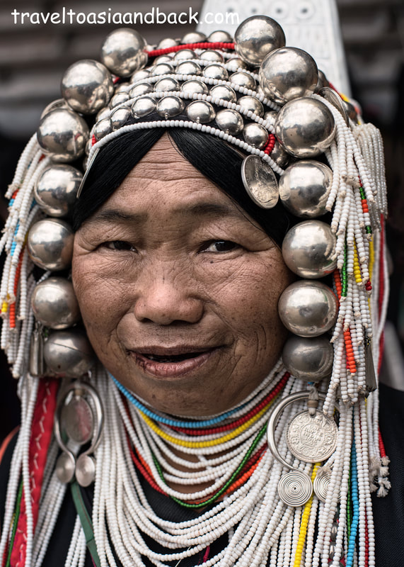 traveltoasiaandback.com - Akha woman wearing a traditional Lomue Akha costume.  Mae Salong, Chiang Rai Province, Thailand, Asia