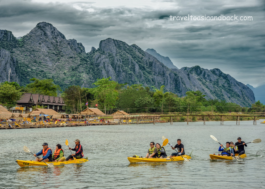 traveltoasiaandback.com - Kayaking on the Nam Song River,  Vang Vieng, Laos