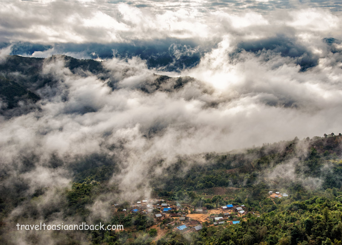 traveltoasiaandback.com - Clouds roll into the valley blanketing Namleng Village, Phongsaly Province, Laos