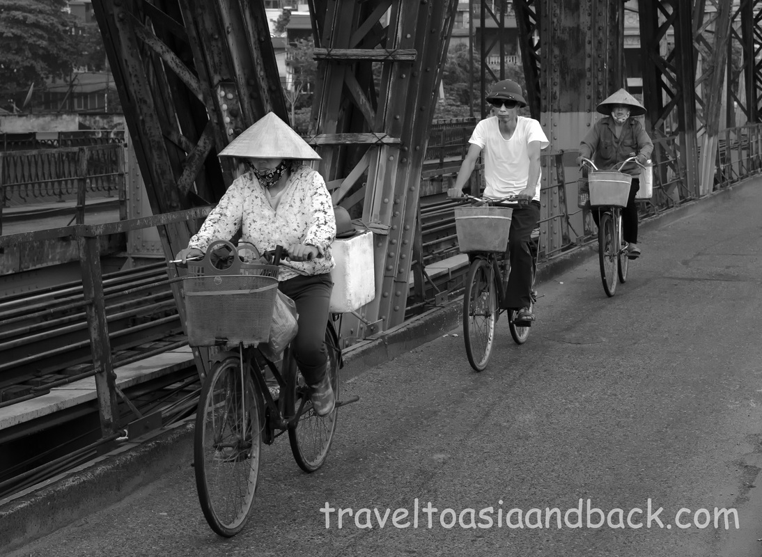 traveltoasiaandback.com -  Morning traffic on Long Biên Bridge, Hanoi, Vietnam