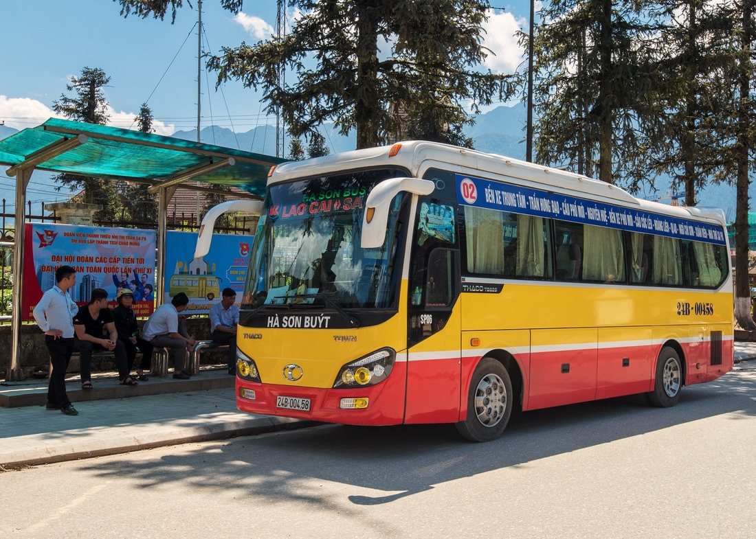 traveltoasiaandback.com - The public bus, the cheapest transportation option between Lao Cai City  and Sapa.
