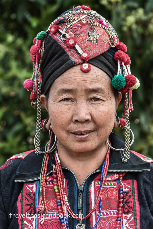 traveltoasiaandback.com - Wife of the village chief, Akha Oma costume,Namleng Village, Phongsaly Province, Laos