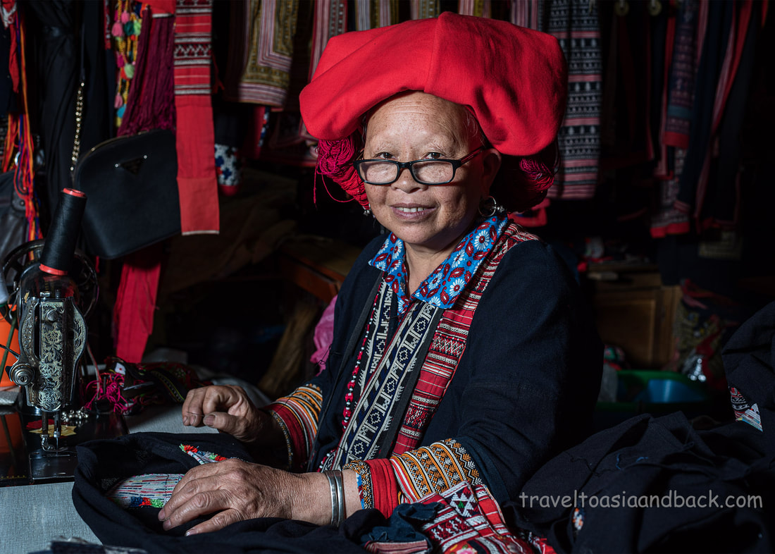 traveltoasiaandback.com - A woman from the Red Dao ethnic group. Sapa market, Lao Cai Province, Vietnam.