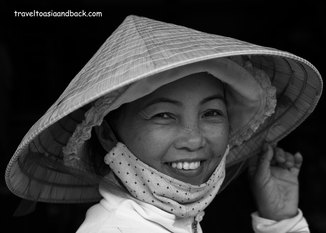 traveltoasiaandback.com - A friendly resident of Hoi An, Quang Nam Province, Vietnam